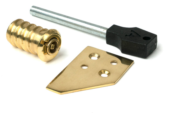 From The Anvil's Polished Brass Key-Flush Sash Stop