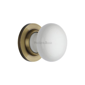 Plain White Porcelain Door Knob on Rose by M Marcus - Heritage Brass