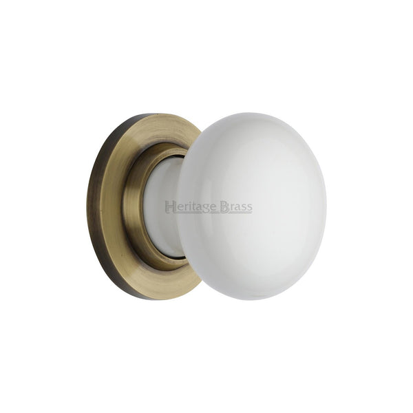 Plain White Porcelain Door Knob on Rose by M Marcus - Heritage Brass