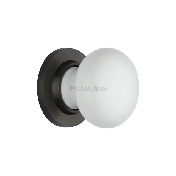 Plain White Porcelain Door Knob on Rose by M Marcus - Heritage Brass