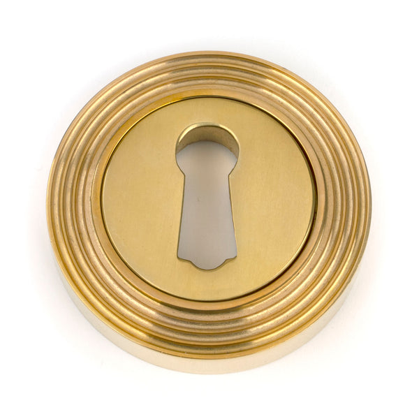 From The Anvil's Polished Brass Round Escutcheon