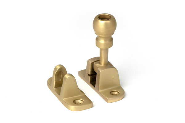 From The Anvil's Satin Brass Mushroom Brighton Fastener
