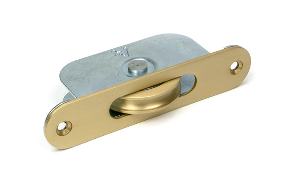 From The Anvil's Satin Brass Radiused Sash Pulley 75kg