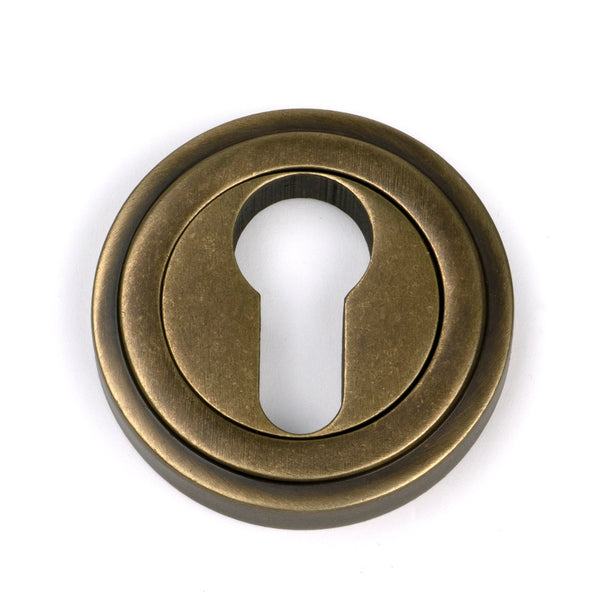 From The Anvil's Burnished Brass Round Euro Escutcheon