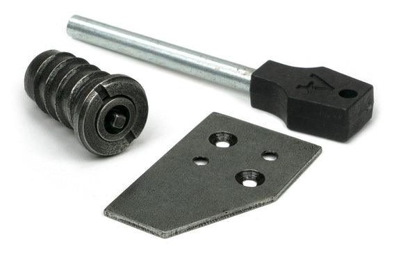 From The Anvil's Pewter Patina Key-Flush Sash Stop