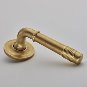 Croft - Crest Door Handle on Reeded Covered Rose 7022COV57C by Croft Ironmongery