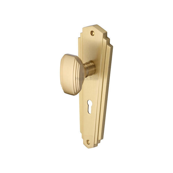Charlston Door Knob on Plate by M Marcus - Heritage Brass