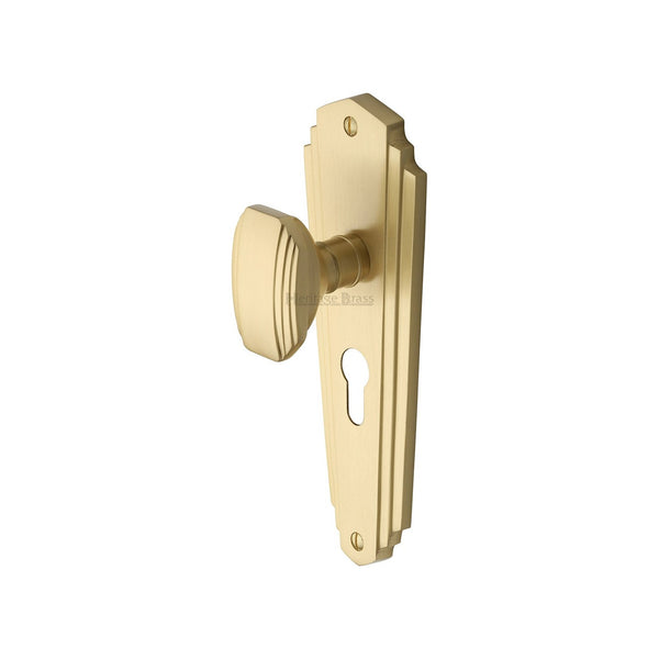 Charlston Door Knob on Plate by M Marcus - Heritage Brass
