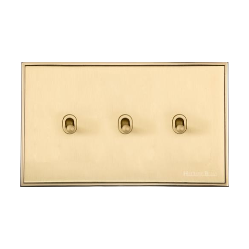 Executive Range Satin Brass with Polished Brass Switches & Sockets, EX14 - 3 Gang Stockholm Toggle by Heritage Brass By M-Marcus