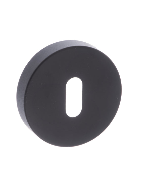 Forme Key Escutcheons on Minimal Round Rose by Atlantic Hardware