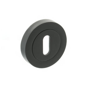 Millhouse Brass Key Escutcheons on Round Rose by Atlantic Hardware