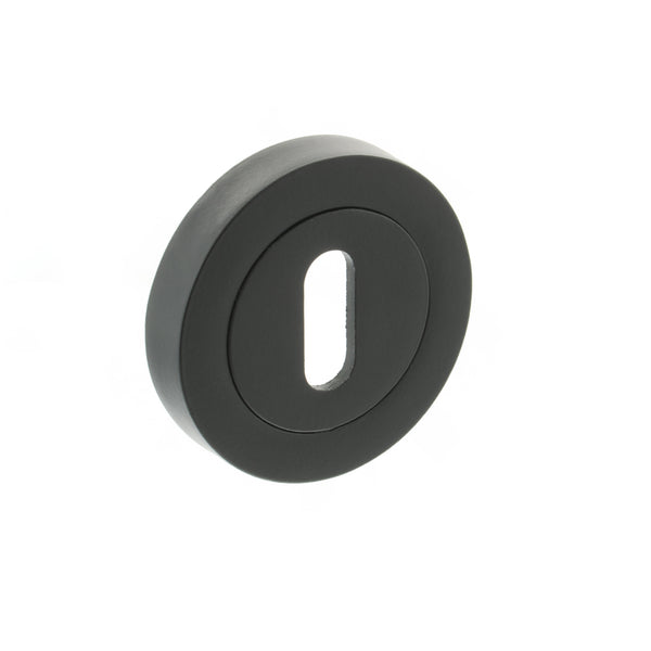 Millhouse Brass Key Escutcheons on Round Rose by Atlantic Hardware