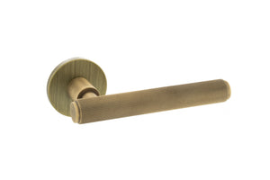 Millhouse Brass Stephenson Knurled Lever Door Handle on 5mm Slimline Round Rose - Yester Bronze by Atlantic Hardware