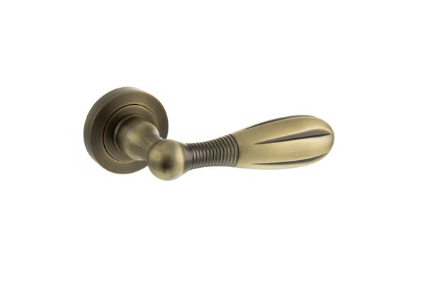Old English Cambridge Lever Door Handle on Round Rose by Atlantic Hardware
