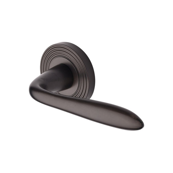 Sutton Reeded Door Handle on Round Rose by M Marcus - Heritage Brass
