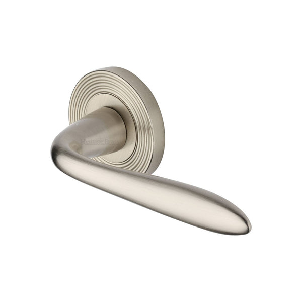 Sutton Reeded Door Handle on Round Rose by M Marcus - Heritage Brass