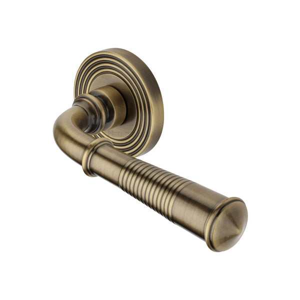 Bridgetown Reeded Door Handle on Round Rose by M Marcus - Heritage Brass