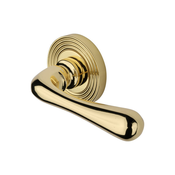 Charlbury Reeded Door Handle on Round Rose by M Marcus - Heritage Brass
