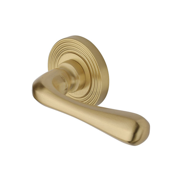 Charlbury Reeded Door Handle on Round Rose by M Marcus - Heritage Brass