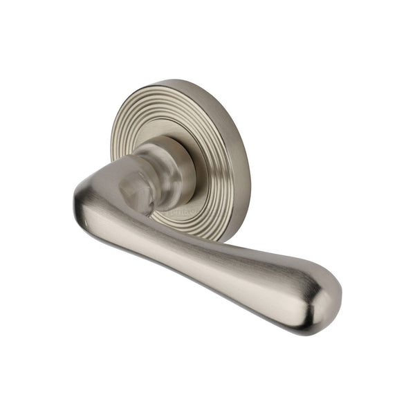 Charlbury Reeded Door Handle on Round Rose by M Marcus - Heritage Brass