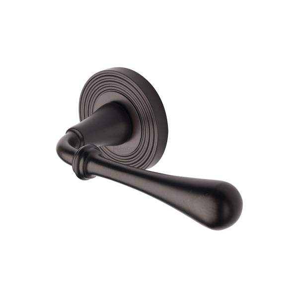Roma Reeded Door Handle on Round Rose by M Marcus - Heritage Brass