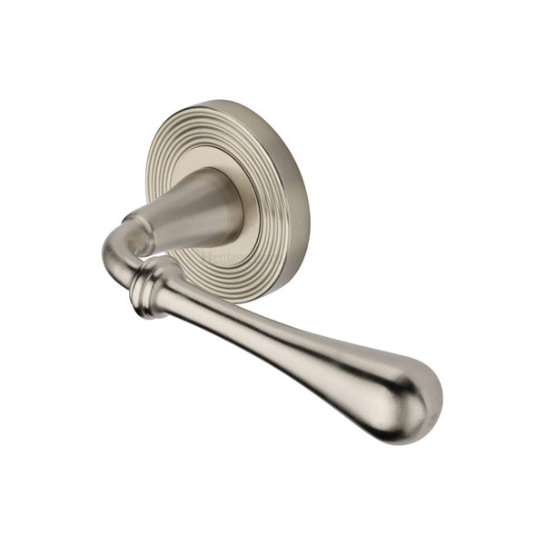 Roma Reeded Door Handle on Round Rose by M Marcus - Heritage Brass
