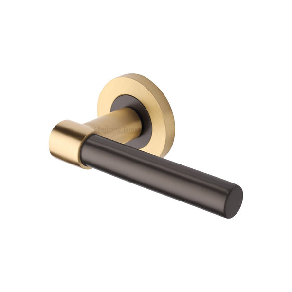 Phoenix Door Handle on Round Rose by M Marcus - Heritage Brass