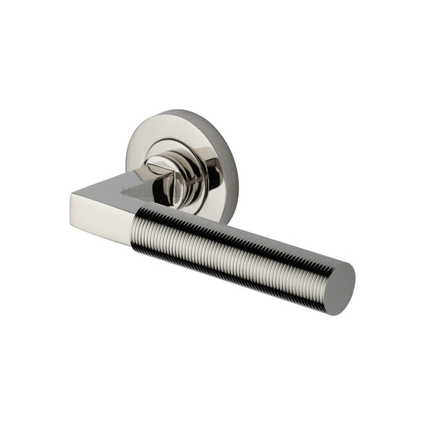 Spectral Door Handle on Round Rose by M Marcus - Heritage Brass