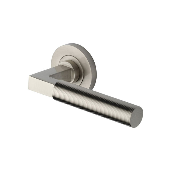 Spectral Door Handle on Round Rose by M Marcus - Heritage Brass