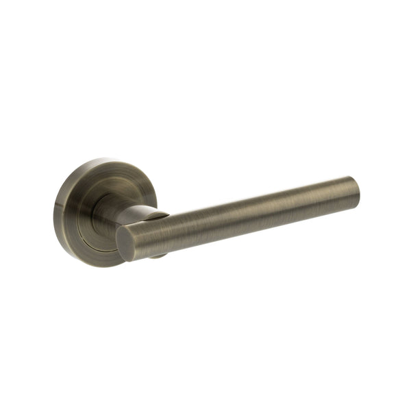 Status Nebraska Lever Door Handle on Round Rose by Atlantic Hardware