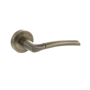 Status Indiana Lever Door Handle on Round Rose by Atlantic Hardware