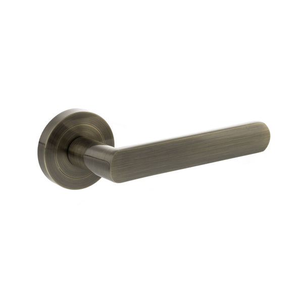 Status Carolina Lever Door Handle on Round Rose by Atlantic Hardware