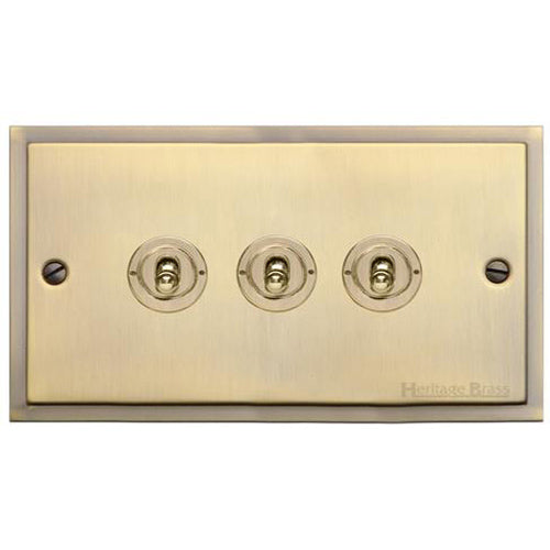 Elite Stepped Plate Range Antique Brass Switches & Sockets, S91 - 3 Gang Toggle Switch by Heritage Brass By M-Marcus