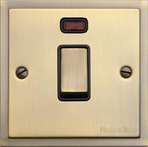 Heritage Brass Electrical, Elite Stepped Plate Range - Antique Brass - 20 Amp DP Switch with Neon, 20 Amp DP Switch with Neon, 20 Amp Double Pole Switches, 20 Amp DP Switch with Neon