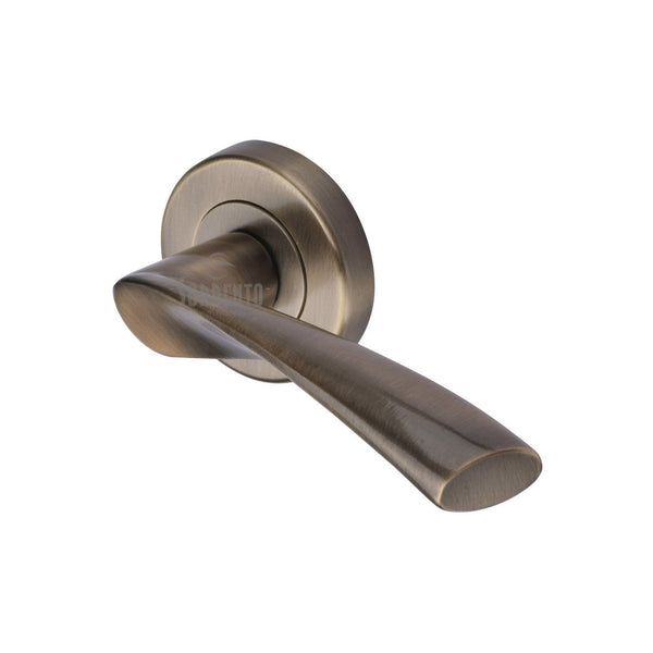 Treviso Door Handle on Round Rose by M Marcus - Heritage Brass