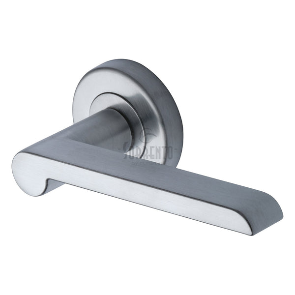 Lugano Door Handle on Round Rose by M Marcus - Heritage Brass