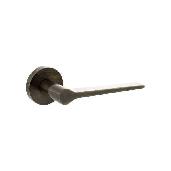 Senza Pari Laviano Lever Door Handle on Minimal Round Rose by Atlantic Hardware