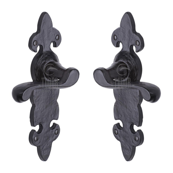 Tudor Fleur de Lys Door Handle on Plate by M Marcus - Heritage Brass