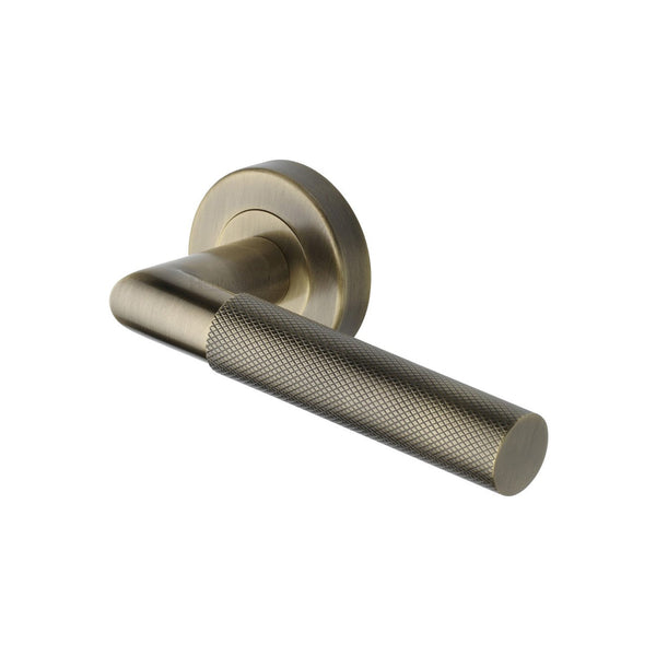 Bauhaus Mitre Knurled Door Handle on Round Rose by M Marcus - Heritage Brass