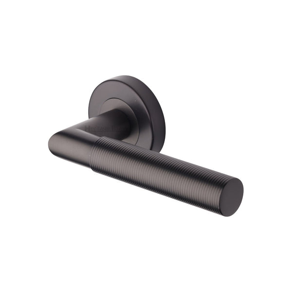 Bauhaus Mitre Reeded Door Handle on Round Rose by M Marcus - Heritage Brass