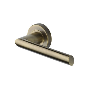 Mercury Door Handle on Round Rose by M Marcus - Heritage Brass