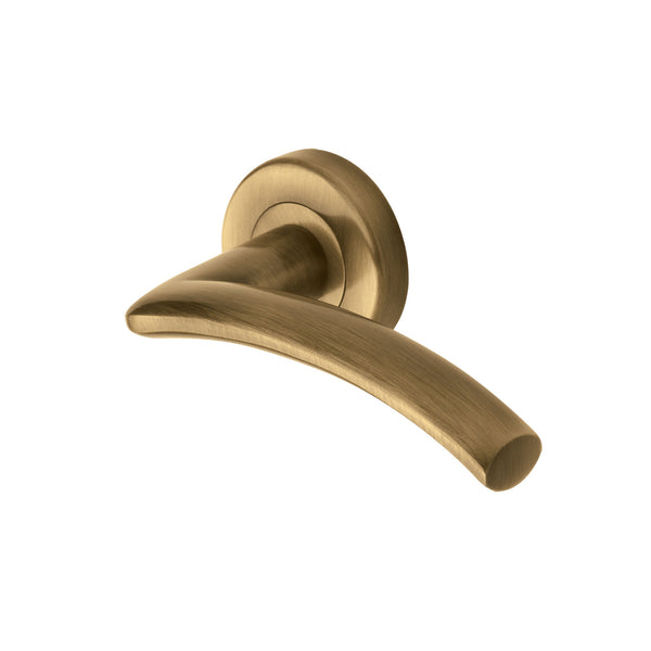 Centaur Door Handle on Round Rose - Antique Brass