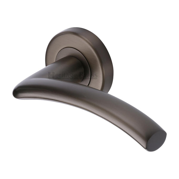 Centaur Door Handle on Round Rose by M Marcus - Heritage Brass