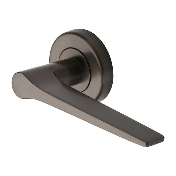 Gio Door Handle on Round Rose by M Marcus - Heritage Brass