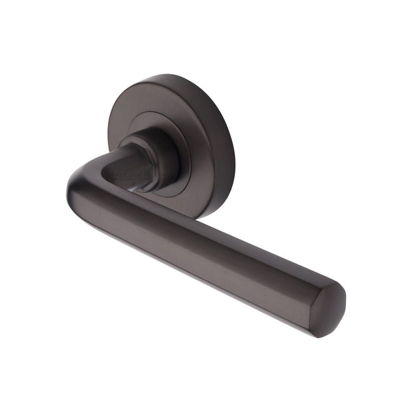 Octave Door Handle on Round Rose by M Marcus - Heritage Brass