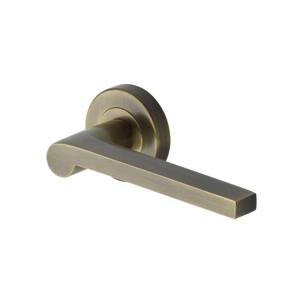 Metro Mid Century Door Handle on Round Rose by M Marcus - Heritage Brass