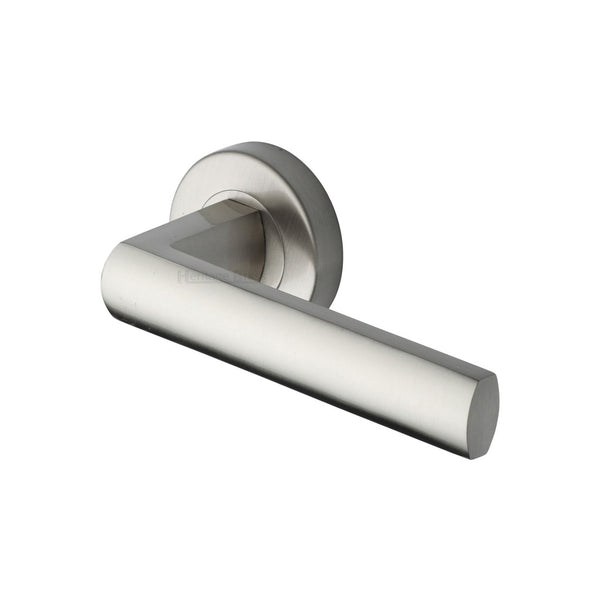 Poseidon Door Handle on Round Rose by M Marcus - Heritage Brass