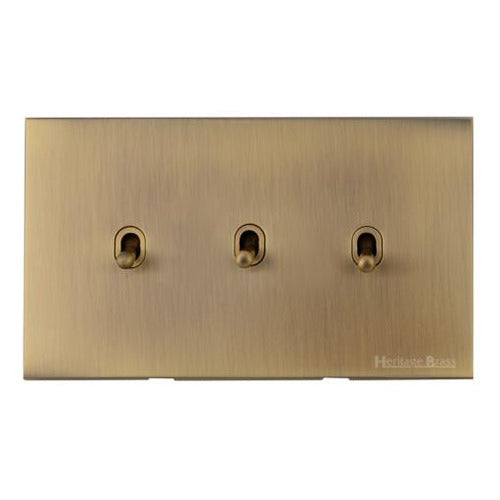 Windsor Range Antique Brass Switches & Sockets, WN91 - 3 Gang Stockholm Toggle by Heritage Brass By M-Marcus