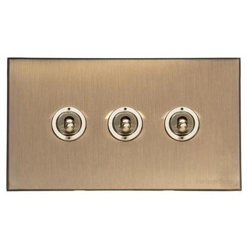 Windsor Range Antique Brass Switches & Sockets, WN91 - 3 Gang Toggle Switch by Heritage Brass By M-Marcus