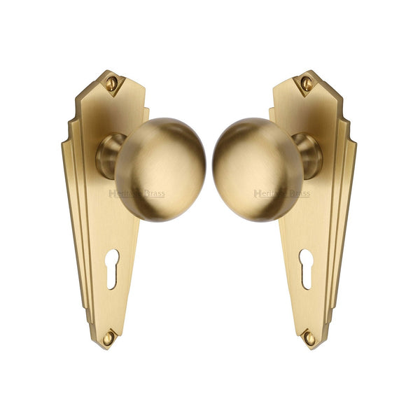 Broadway Door Knob on Plate by M Marcus - Heritage Brass